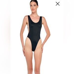 Women’s Norma Kamali black swimsuit. Good condition. Size M.